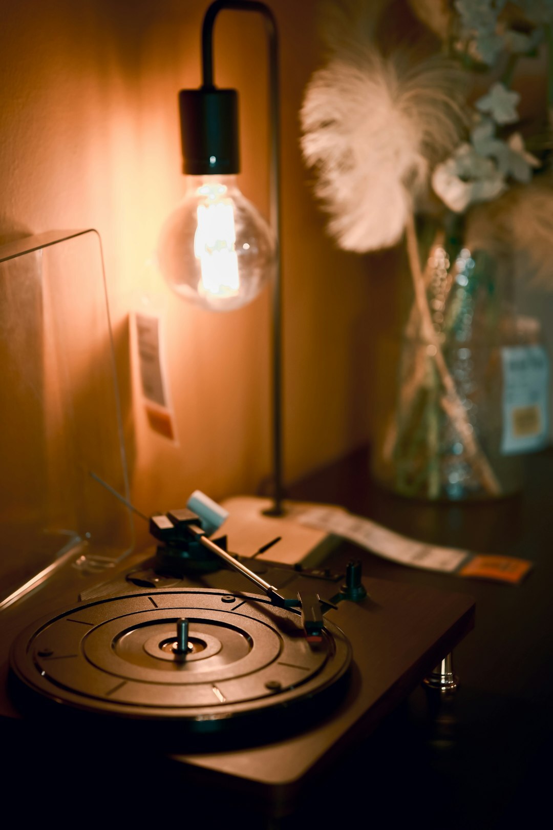 Vintage decorative still life with record player and retro lamp